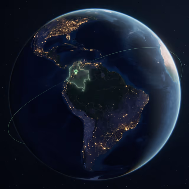 La Tierra de noche con Colombia marcada en verde.